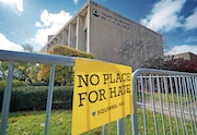 A sign hangs from a fence outside the dormant landmark Tree of Life synagogue in Pittsburgh’s Squirrel Hill neighborhood on Oct. 27, the fourth year since 11 people were killed in America’s deadliest antisemitic attack. (Gene J. Puskar/ Associated Press)