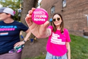 Jess Preleski of Planned Parenthood of Metropolitan NJ hands out buttons as an abortion-rights rally is held at Spiotta Park in South Orange on Friday, June 24, 2022